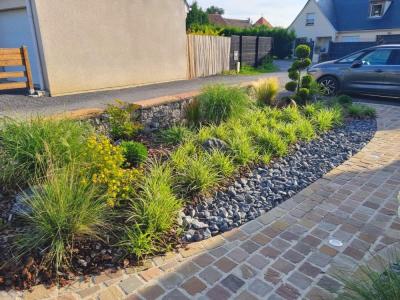 Réalisation de massifs de fleurs - plantation arbustes